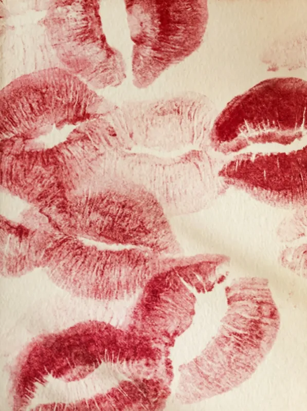 crimson lipstick kiss marks scattered on cream paper wall art print